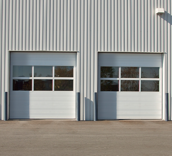 Garaga residential garage door in Tex White with the 4 Grooves design.