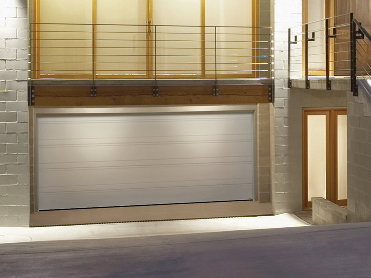 Garaga residential garage door in Tex White with the 2 Grooves design.