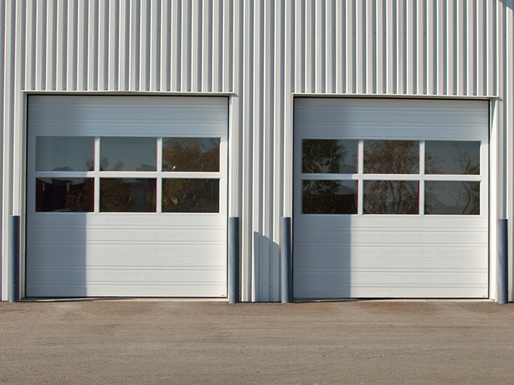 Garaga residential garage door in Tex White with the 4 Grooves design.