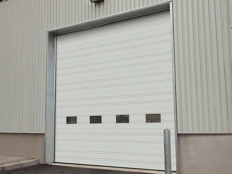 Garaga G-2323 commercial garage door in Tex White with the Flush design.