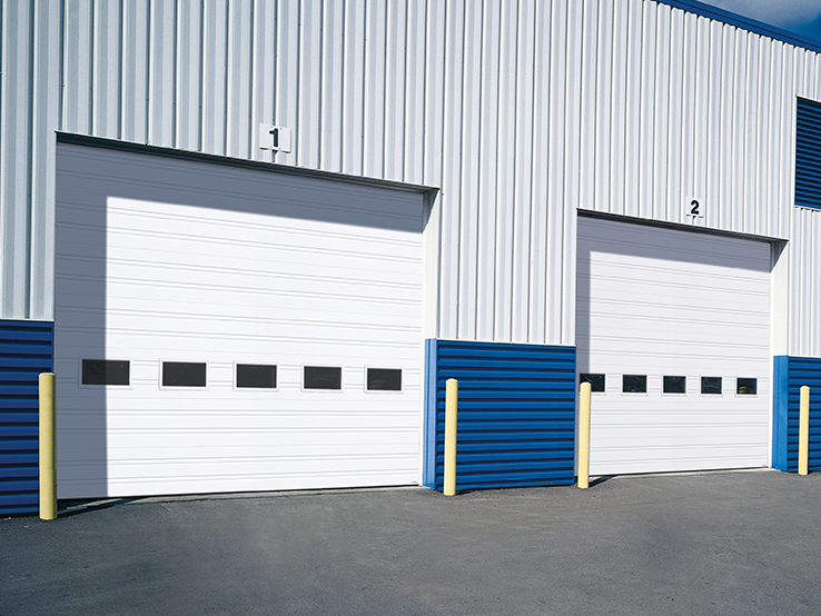 Garaga residential garage door in White with the 4 Grooves design.