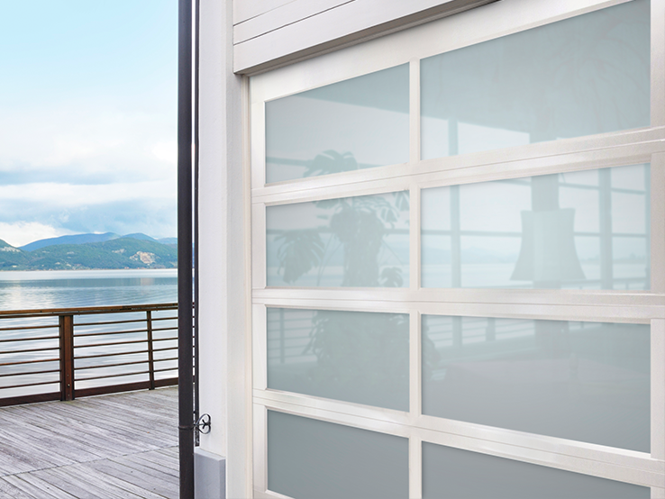 Garaga residential garage door with the Grid all-glass design, White frame and White Sandblasted glass.