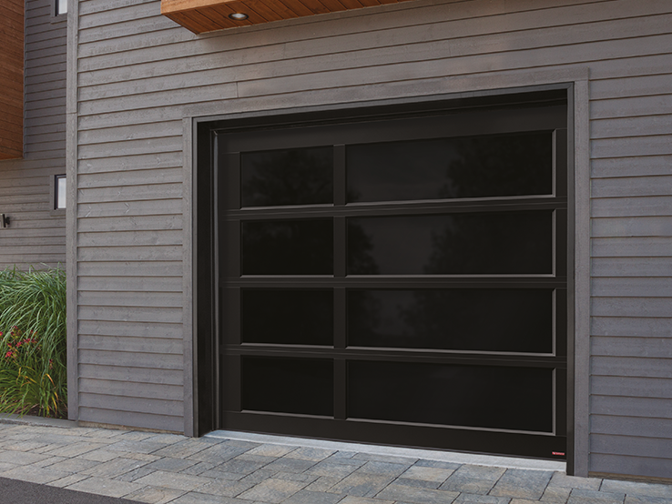Garaga residential garage door with the Offset all-glass design, Black frame and Black Satin glass.