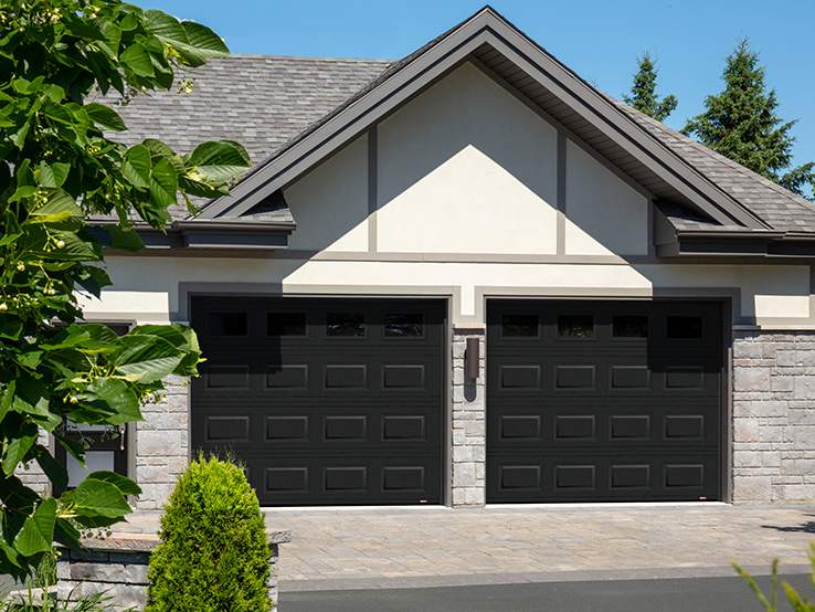 Garaga residential garage door in Black with the Classic CC design and Clear glass.