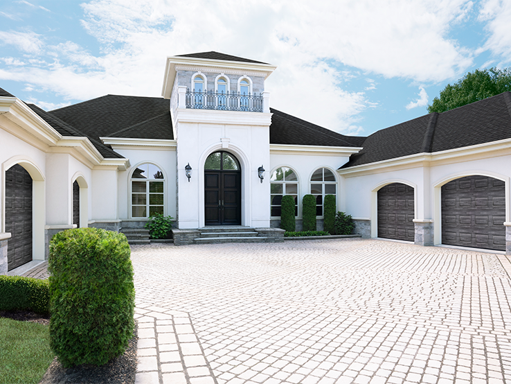 Garaga residential garage door with a Weathered Grey faux-wood finish and the Classic CC design.