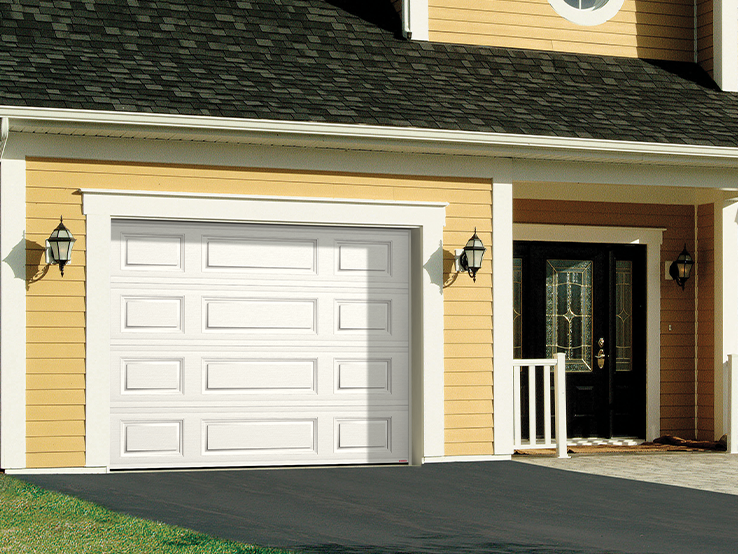 Garaga residential garage door in Ice White with the Classic Mix design.