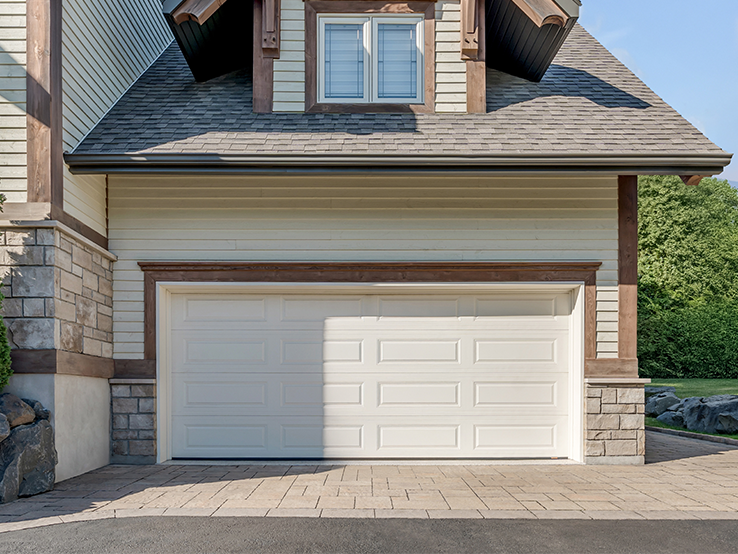 Garaga residential garage door in Desert Sand with the Classic XL design.