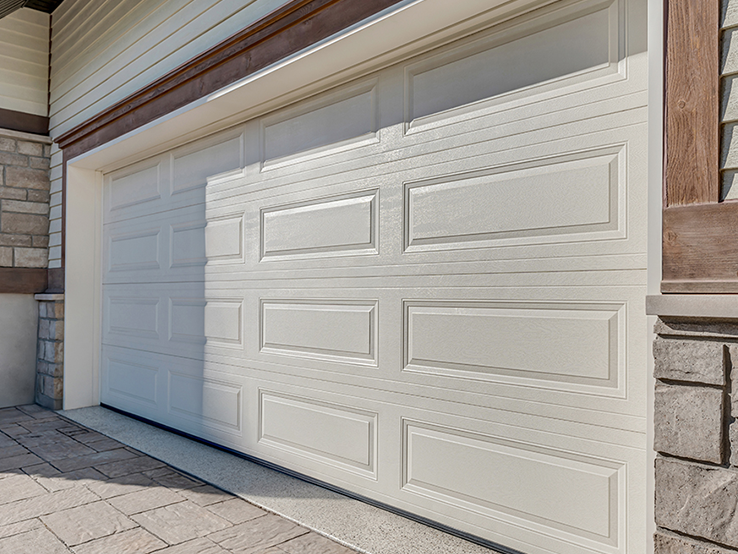 Garaga residential garage door in Desert Sand with the Classic XL design.