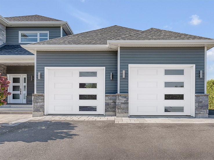 Garaga residential garage door in Ice White with the Classic XL design and Right-side Harmony windows with tinted glass.