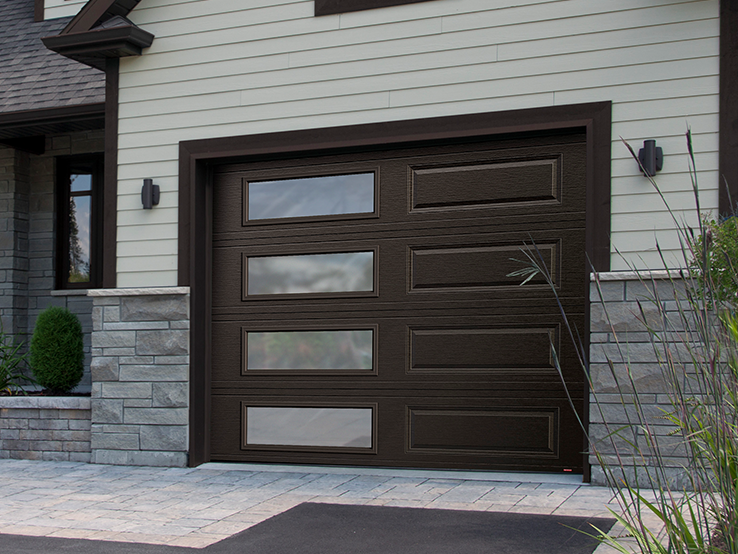 Garaga residential garage door in Moka Brown with the Classic XL design and left-side Harmony windows.