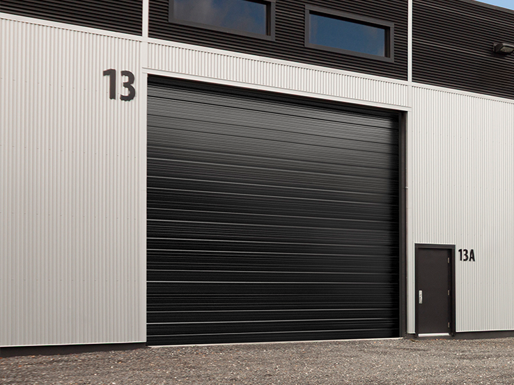 Garaga OBI & OB 2024 & 2025 SSI commercial garage door in Commercial Black, 20' x 18', Deep Grooves design and Smooth steel.