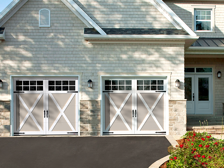 Garaga residential garage door in Claystone with the E-21 design, Ice White overlays and Panoramic windows.