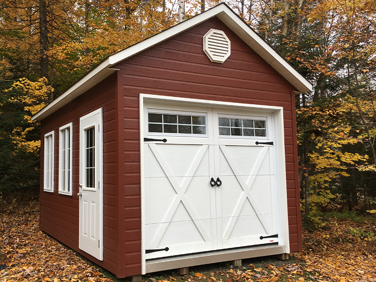 Garaga residential garage door in Ice White with the E-21 design, matching overlays and Orion windows.