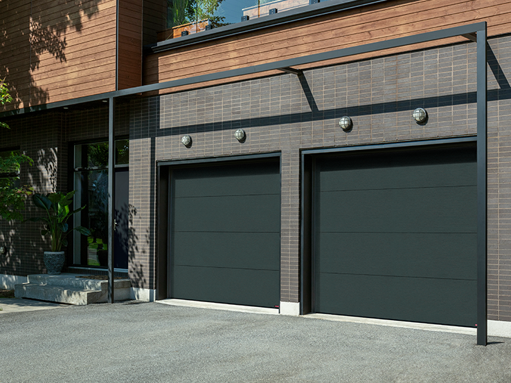 Garaga residential garage door in Iron Ore with the Flush design.
