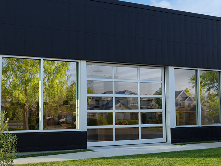 Garaga G-4400 commercial garage doors, 12' x 10' all-glass, Anodized frame and Clear glass.