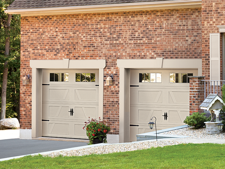 Garaga residential garage door in Sahara with the A design, a recessed base and Richmond window inserts.