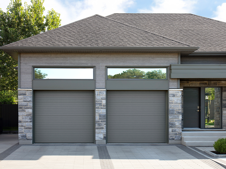 Garaga residential garage door in Charcoal with the Moderno Multi design.