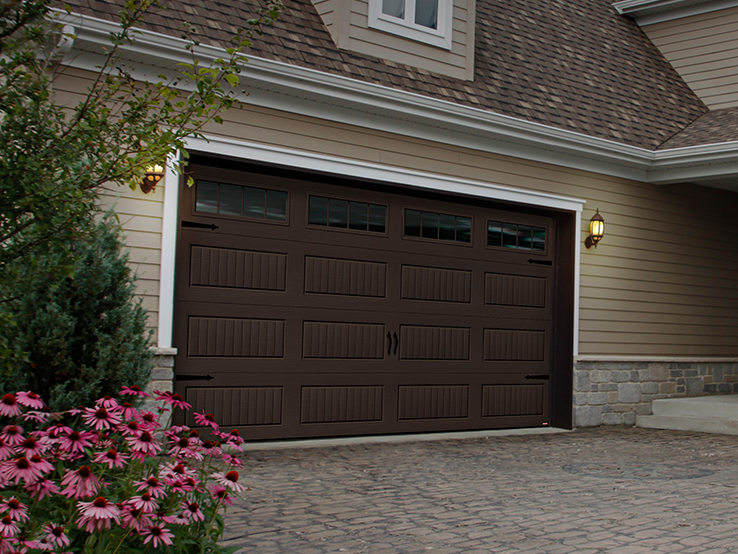 Garaga residential garage door in Moka Brown with the North Hatley LP design and Orion windows.