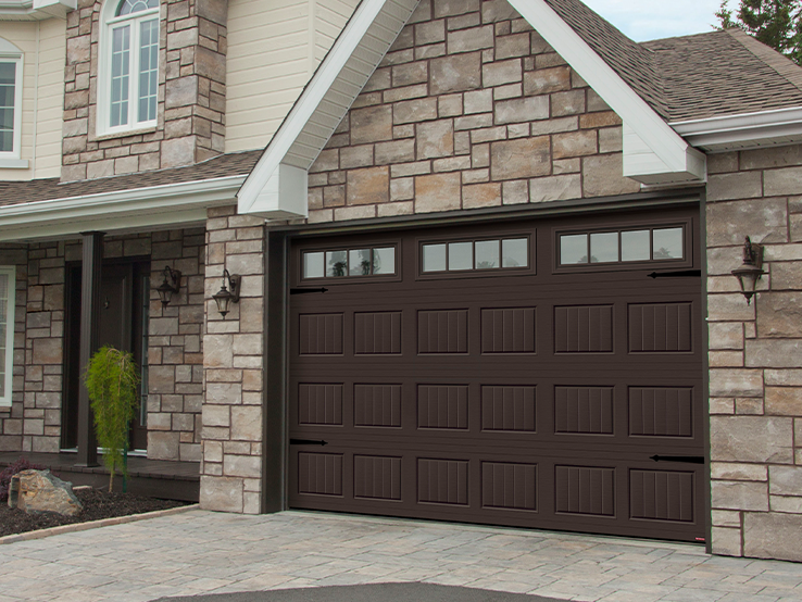Garaga residential garage door in Moka Brown with the North Hatley SP design and Orion windows.