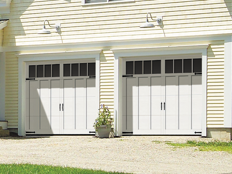 Garaga residential garage door in White with the I2 design, matching overlays and Richmond windows.