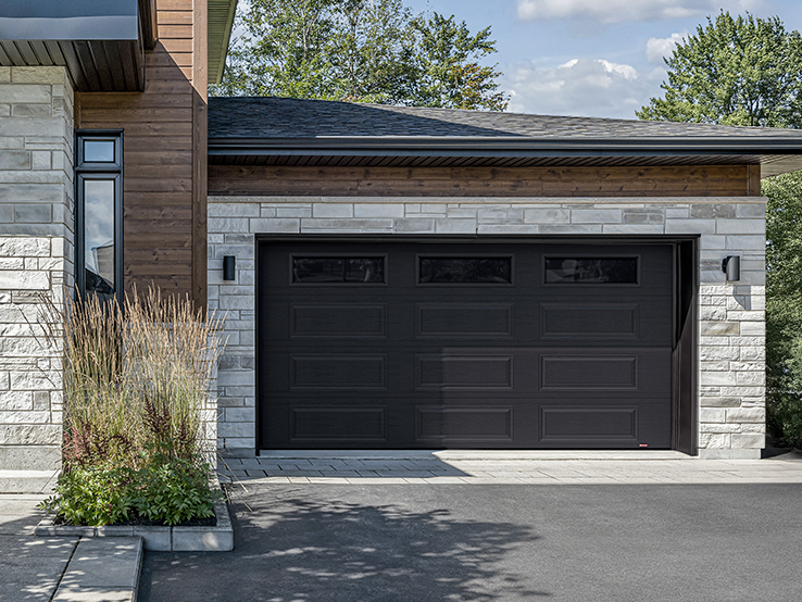 Garaga residential garage door in Black with the Prestige XL design and Black Satin glass.