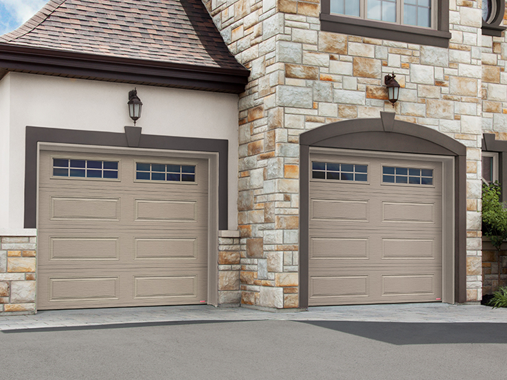 Garaga residential garage door in Claystone with the Prestige XL design and Orion windows.