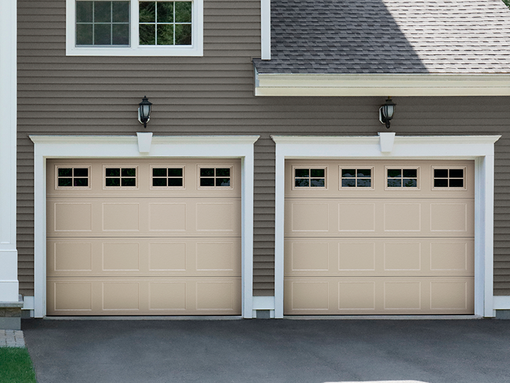 Garaga residential garage door in Sahara with the Recessed Short design and Stockton window inserts.