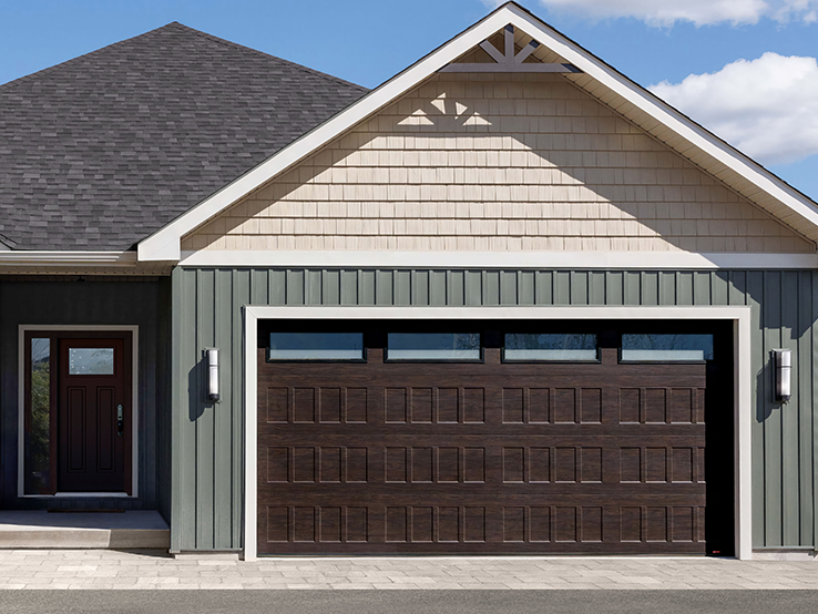 Garaga residential garage door with a Dark Walnut faux-wood finish, the Shaker-Flat XS design and White Sandblasted glass.