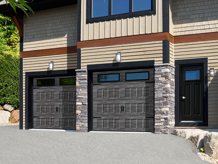 Garaga residential garage door with a Weathered Grey faux-wood finish, the Shaker-Flat XS design and Clear glass.