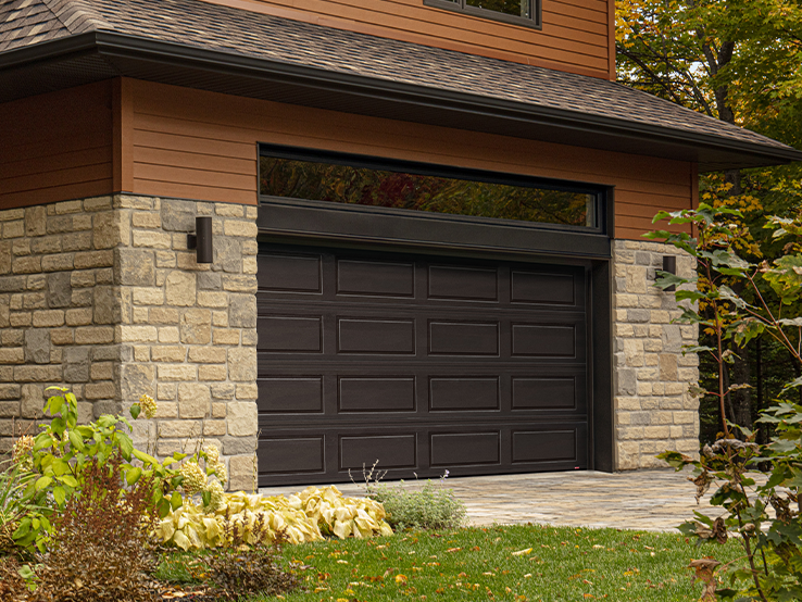 Garaga residential garage door in Moka Brown with the Shaker-Modern XL design.