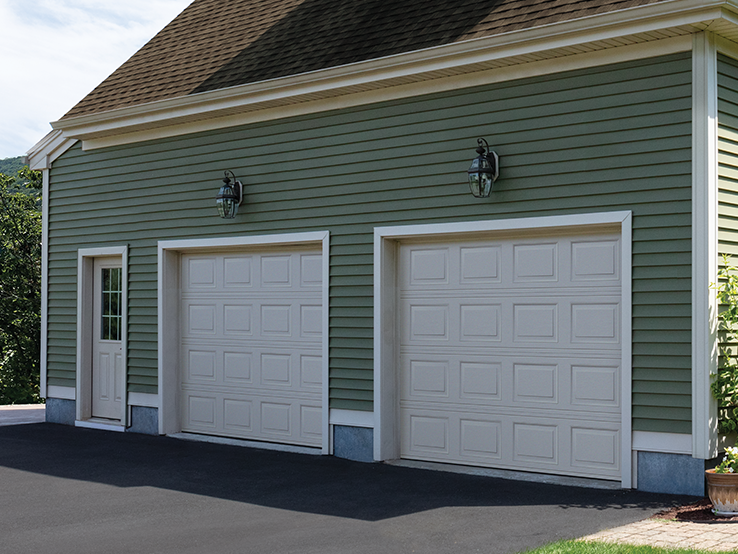 Garaga residential garage door in Almond with the Short Panel design.