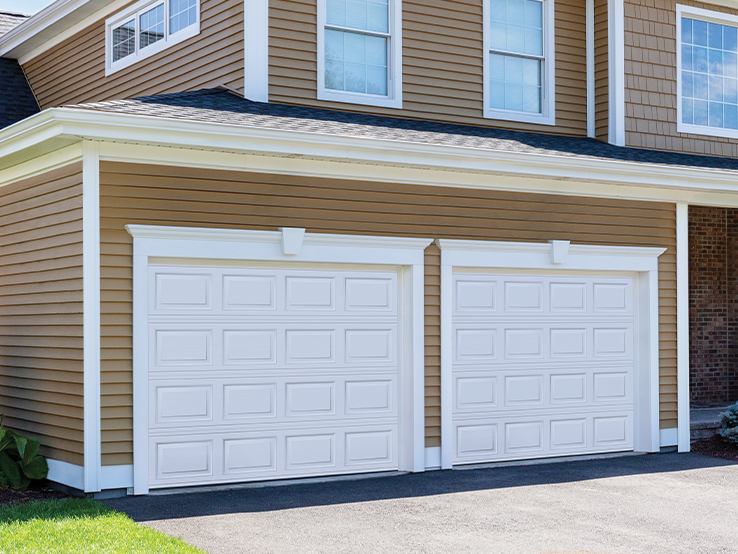 Garaga residential garage door in White with the Short Panel design.