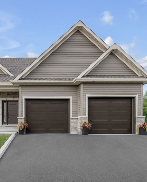 Garaga residential garage door in Moka Brown with the Vogue design.
