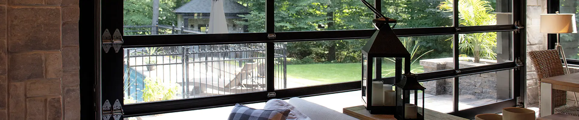 Interior view of a finished garage with full-glass California garage doors