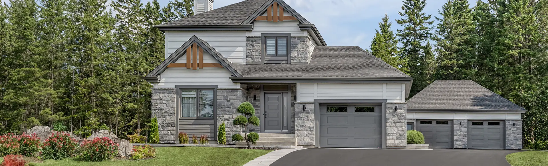 Transitional style house with an attached and detached garages, single garage doors in Shaker-Modern design, Charcoal Gray, with windows